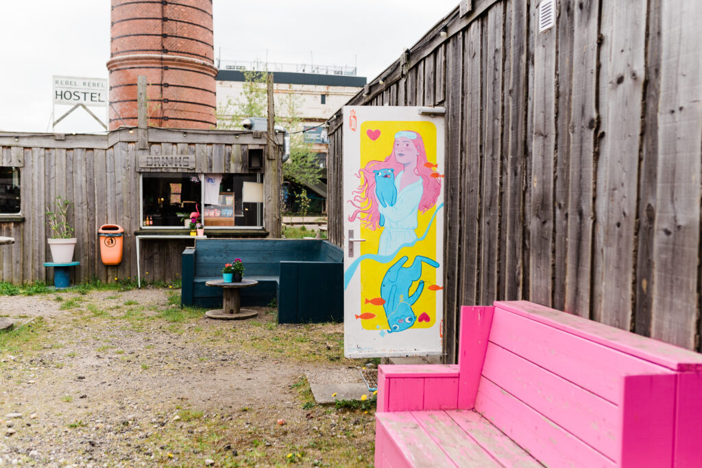 Pink Bench and artwork by Cristina at Rebel Rebel Hostel